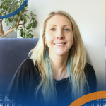 Professional headshot of Jessica Tindall seated indoors with a plant behind.